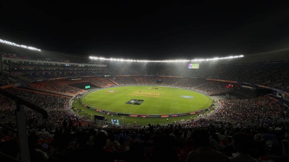 A large crowd of sports fans in a stadium
